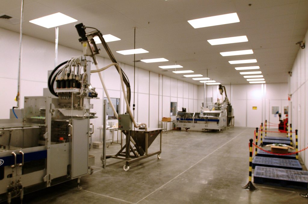 Interior view of machine safety enclosures by MachineEnclosure.com housing automated equipment.