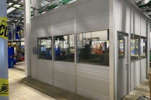 Modular metrology lab enclosures by MachinEnclosure inside a manufacturing facility